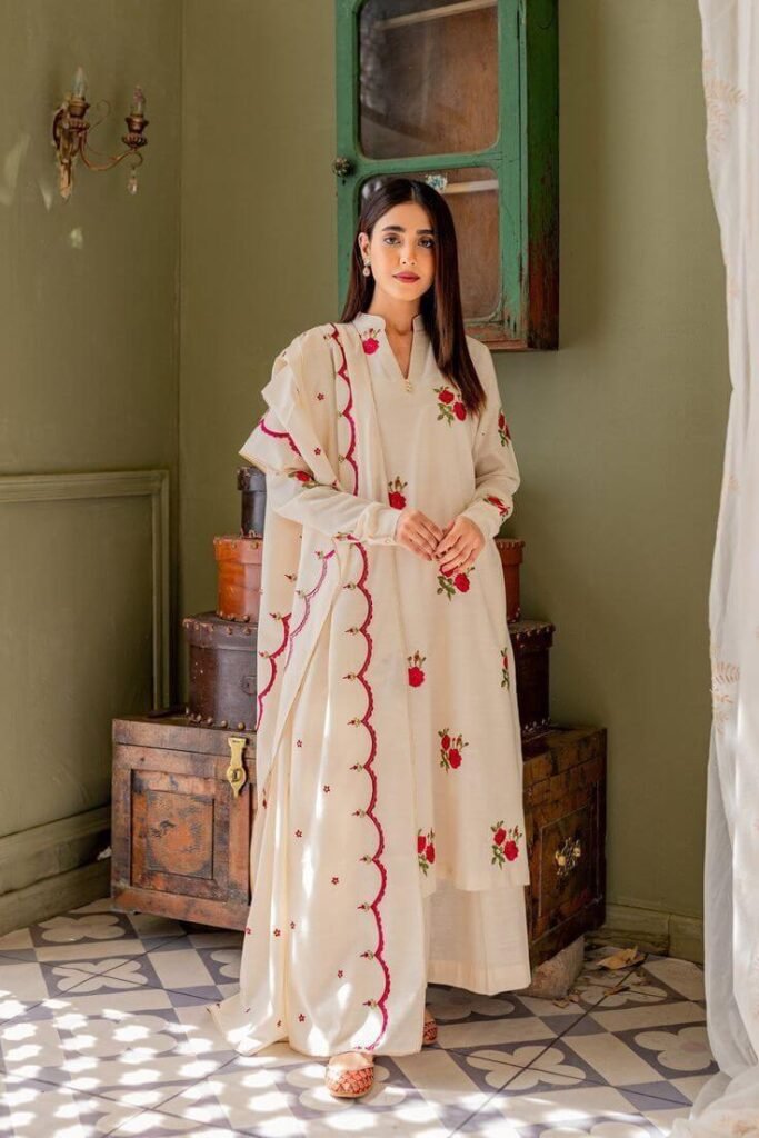  beautifully embroidered cream salwar suit . Crafted from premium cotton fabric.best Hand-embroidered kurti set collections in kottakkal.