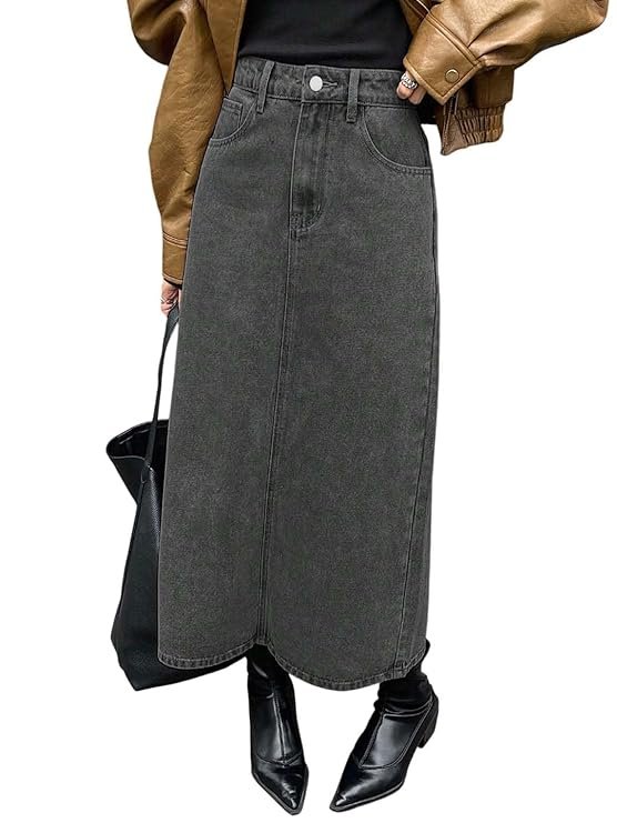 Woman wearing a high-waist black best denim clothes midi skirt paired with a brown leather jacket and black boots — stylish casual outfit in kotakkal 